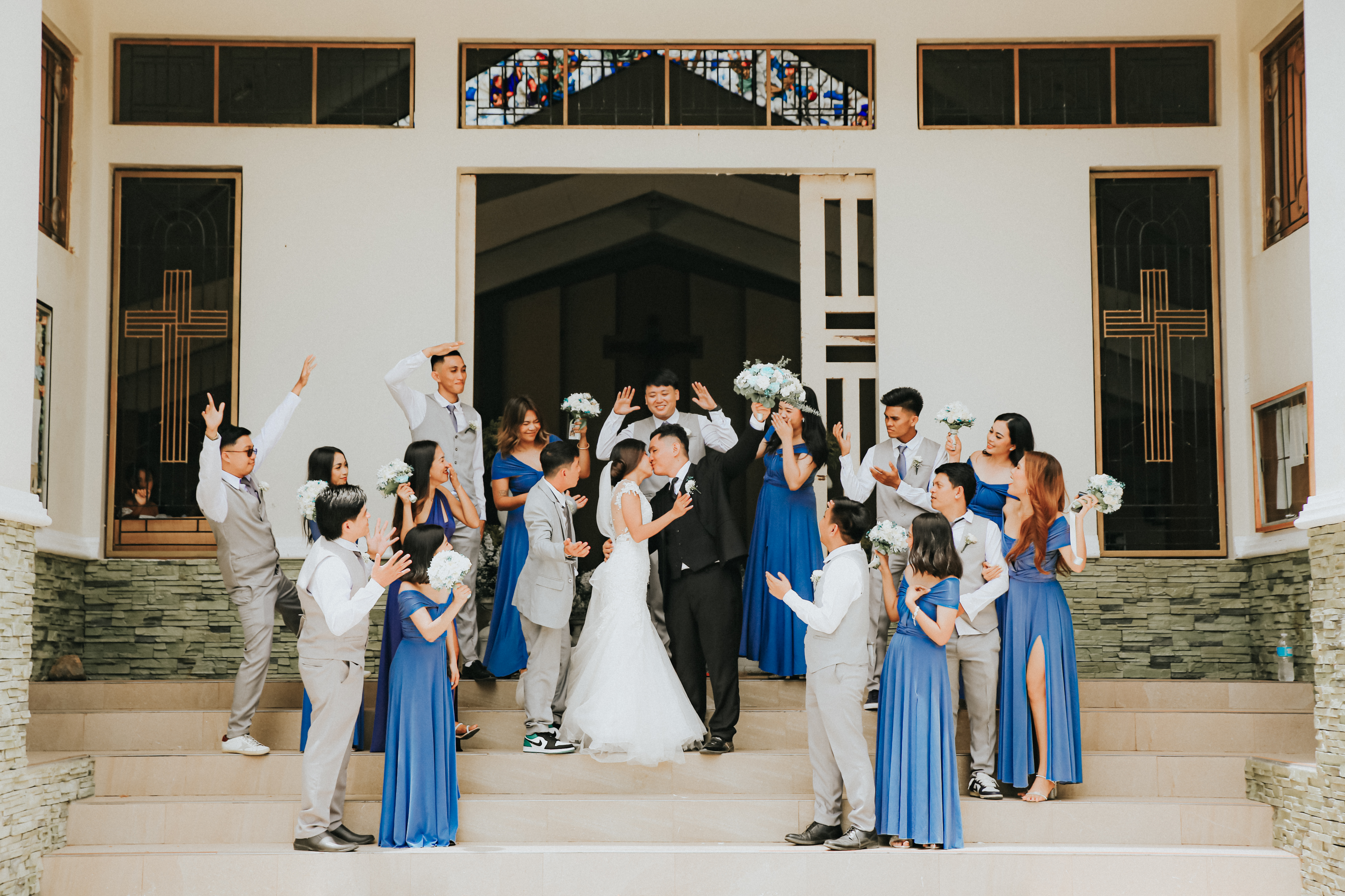 A bride and groom in a tender moment during their wedding.